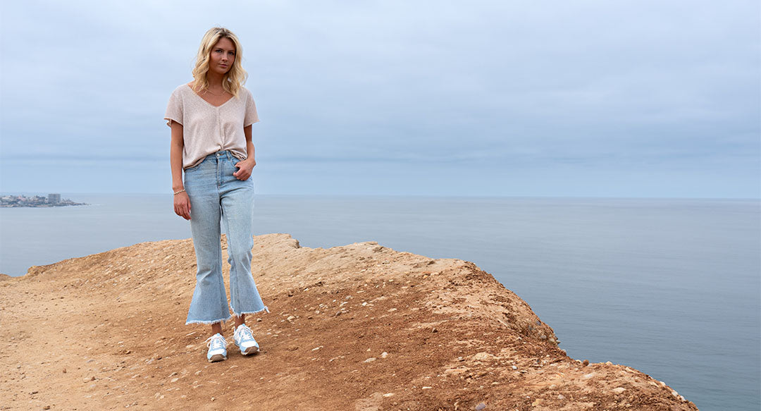 Women's shoes in clear sky color worn from the front