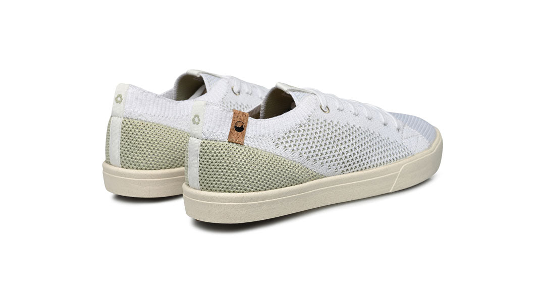 women's white faded green shoes overview from behind