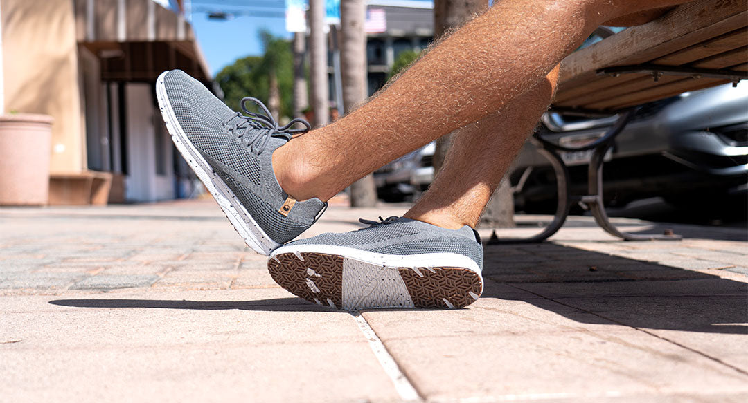 men's charcoal shoes worn from left side