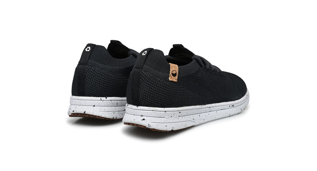 women's black shoes view from behind